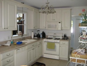 Kitchen with dishwasher, mircowave, and dishwasher