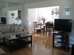 Living Room on the First Level. 2 full couches to watch TV together.