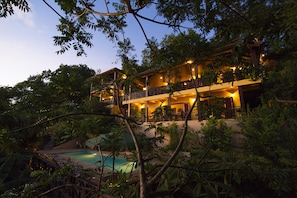 Front view of the villas with the pool...the ocean and cove on the right side