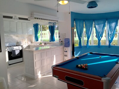 Play pool right next to the pool!