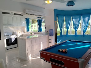 Play pool right next to the pool!