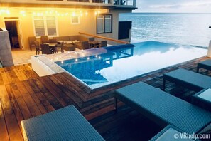 The infinity-edge plunge pool & kiddie pool are solar-heated & are all yours.