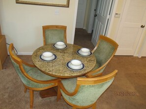Dining Table for 4 and 2 more at the kitchen bar area