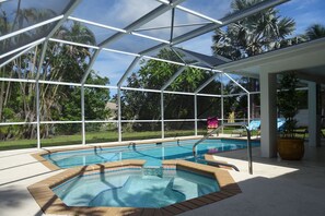 large pool with spa and open but shaded sitting area
