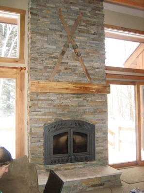 Wrought iron wood fireplace with 12' stone hearth, watch Tram out windows!