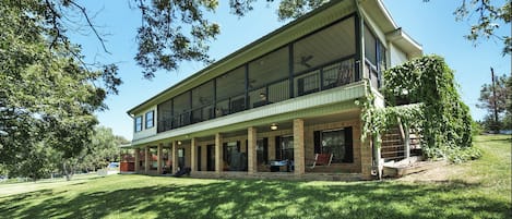 view of the 2 level decks on the back of the house