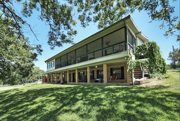 view of the 2 level decks on the back of the house