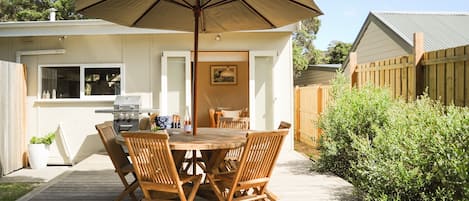 Rear deck with new Recycled Teak Setting!