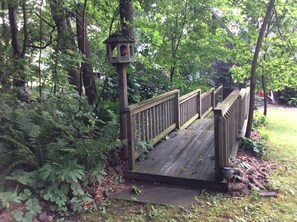 Walk bridge can be seen from the upstairs bedroom follow it down to the  lake . 