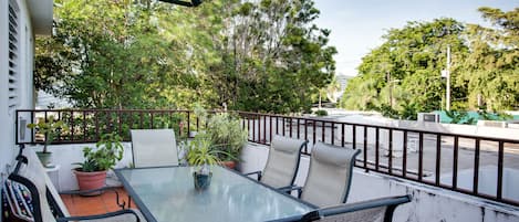 Patio with BBQ and table for six.