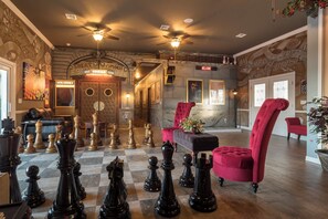 Life-sized chess at the entrance to the home's Jumanji theater