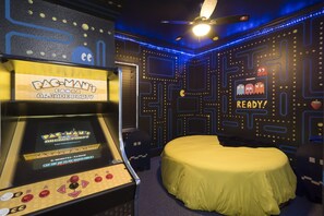 Every last dot is painted. The room has 2 80's consoles AND a multicade!