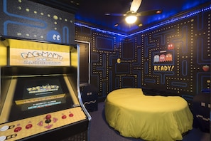 Every last dot is painted. The room has 2 80's consoles AND a multicade!