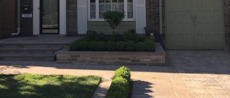 Front Home Exterior and Professional Landscaping