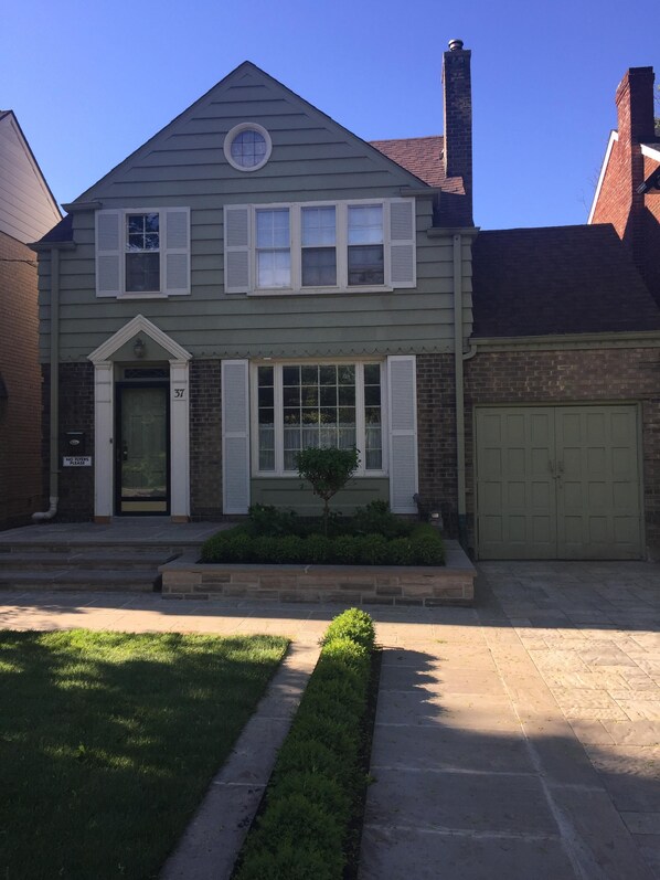 Front Home Exterior and Professional Landscaping
