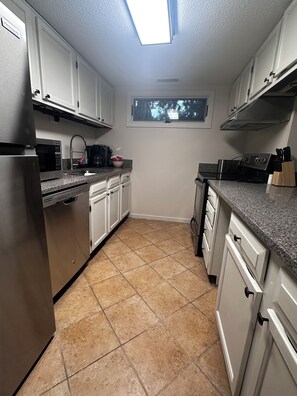 Full appointed kitchen with 
NEW stainless steel appliances & fully stocked