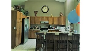Large kitchen with upscale appliances. 