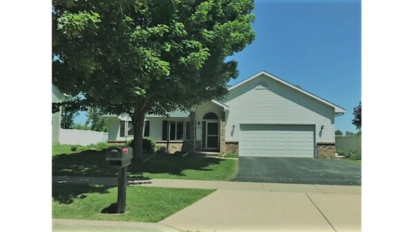 Beautiful landscaped yard on a quiet street.