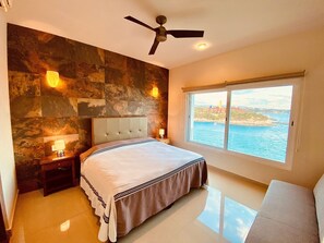 Main bedroom has a king-size bed and a sofa bed.