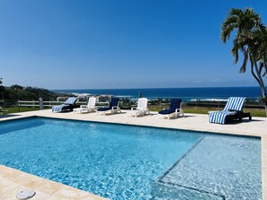 Sun bathe in our beautiful pool deck.