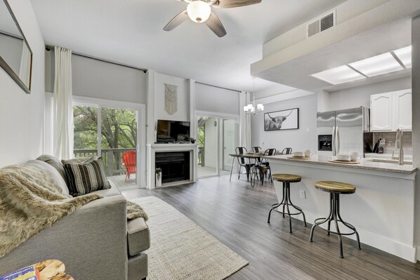 View of living room with view to creek 