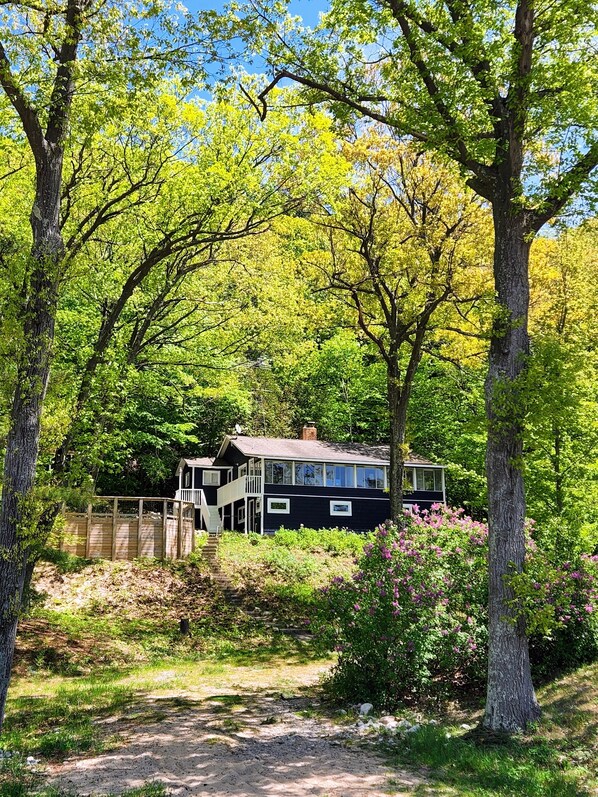 Cottage as seen from the path to the beach.