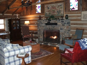 ...facing a stone fireplace in the Main Room