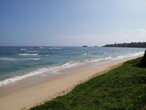 Views of our beach in each direction reveal a quiet setting away from it all