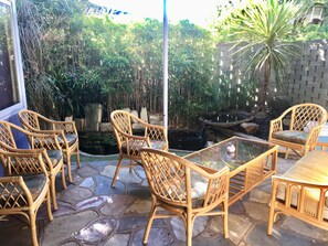 alfresco with tranquil water feature and pond