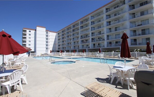 Pool hot tub and kiddie pool on site.
