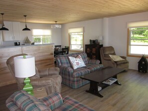 Comfy furniture to relax in and look out on the lake.  