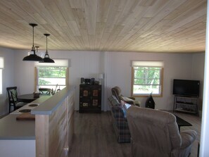 cedar tongue and groove ceiling throughout the living room and hallway.  