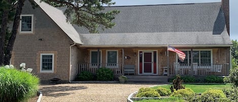 Large front porch welcomes you to the home.