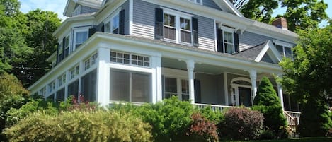 Front of House With Enclosed and Open Porches