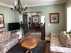 Main level living room followed by dining area. Plenty of windows and light.