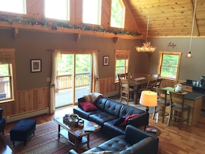 Main level living area, directly off the wrap-around porch with mountain views.