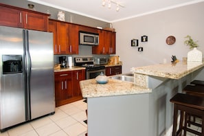 Well appointed Kitchen with stainless steel applieces