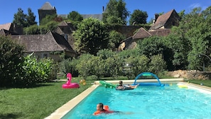 Fun in the pool with castle view