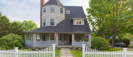 Relax on the front porch and watch people come and go from the beach