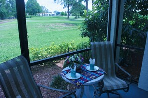 The Lanai overlooks the golf course and canal