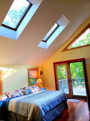 king bedroom with full bath and deck , skylights-bedroom #1