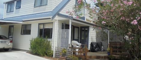 Front deck with french doors off the dining room with the BBQ.