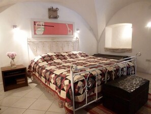 King sized bed in the vaulted sleeping alcove