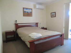 Bed Room 1 with Queen bed, Ceiling Fan, Reverse Cycle Air Con and TV