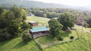 A bird's eye view of the cabin and farm
