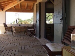 View from the terrace of the garden and summer kitchen