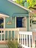 Dutch door and entrance to Beach Bunny Cottage. Charming front porch 