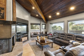 Living room, views of Pikes peak, three sided fire place.
