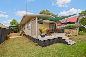 East decks accessed from kitchen / dining area