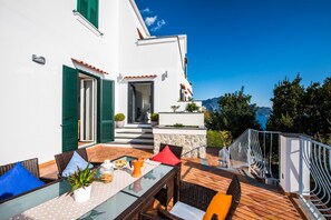 The terrace in front of the kitchen and the living room